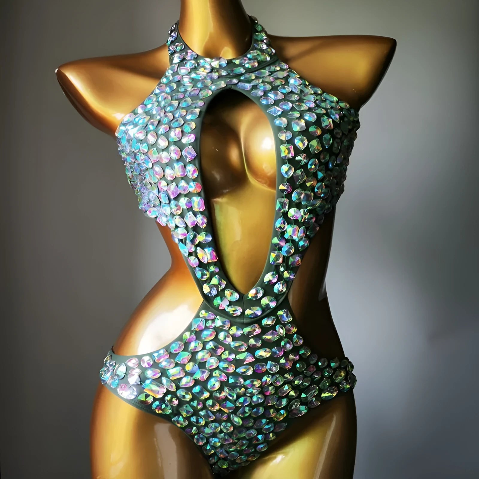 Women's black mesh diamond one-piece swimsuit on a mannequin, showing the front design.