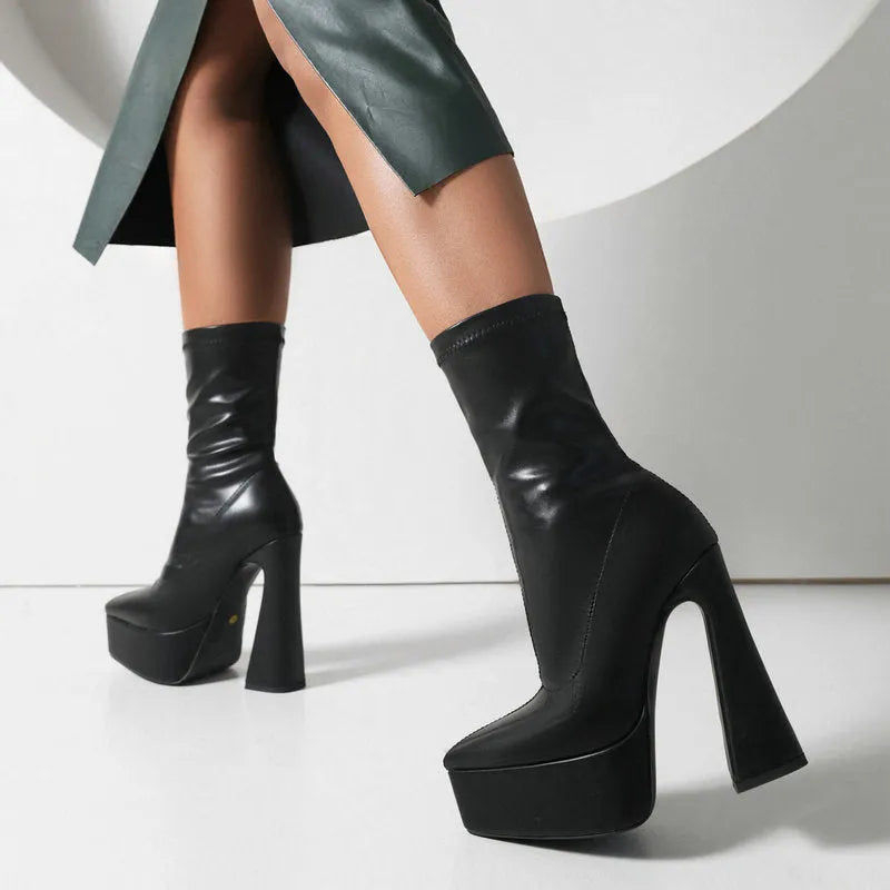 Women's thick heel super high heel platform booties in black with artificial PU upper and rubber sole