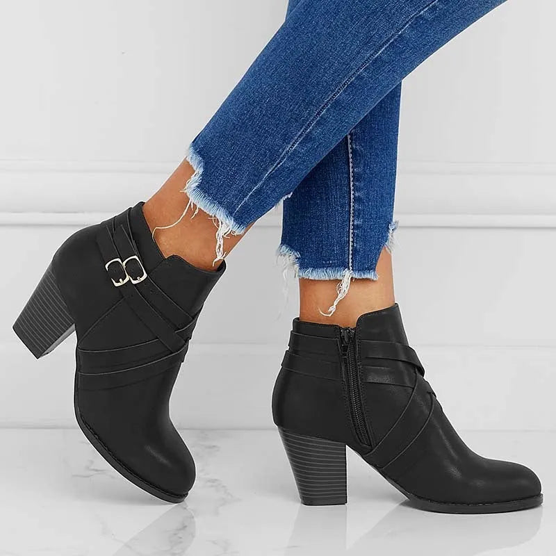 Plus size short ankle boots with a 7cm heel and side zip, shown in grey, black and brown.