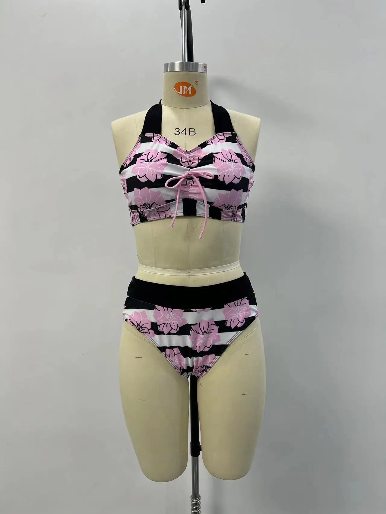 Black women's high-waisted bikini with belly coverage slimming design and split bottom style