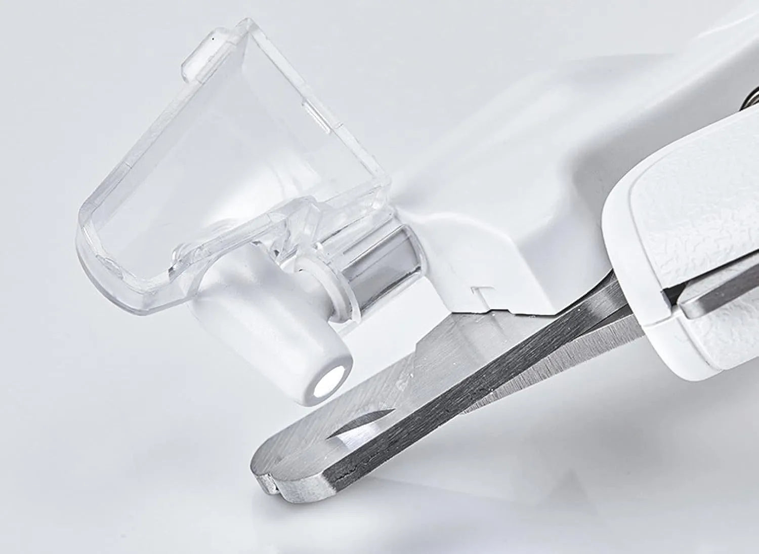 White LED pet nail clipper for cats and dogs with transparent anti-splash guard and file.