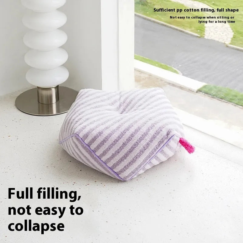 Striped plush dog bed with removable cover in yellow, orange, and purple colour options.