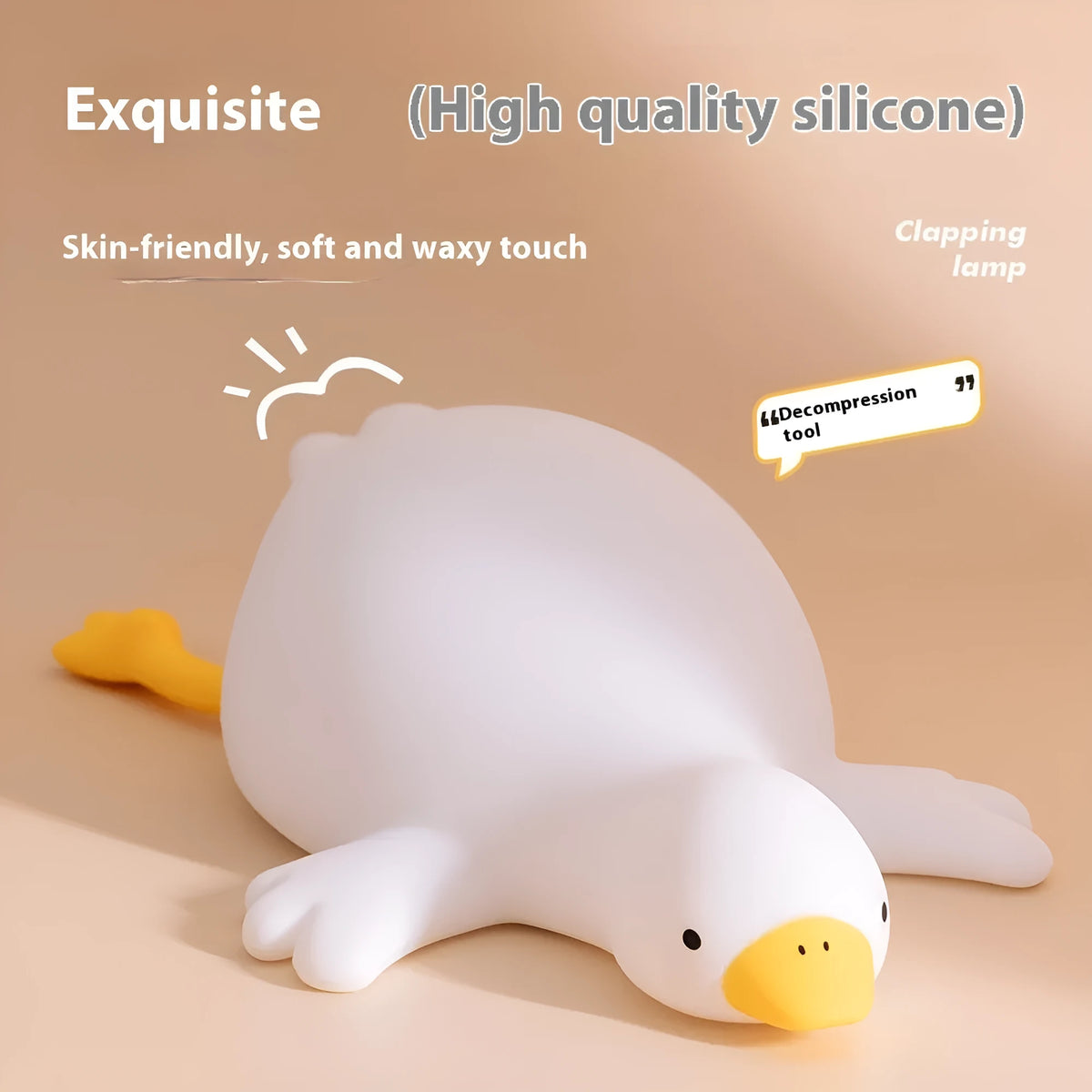 Big White Geese night light with warm white glow and silicone exterior on bedside table