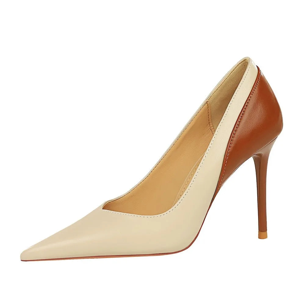 Retro style women's stiletto high heels in black or creamy-white with pointed toe and super high heel