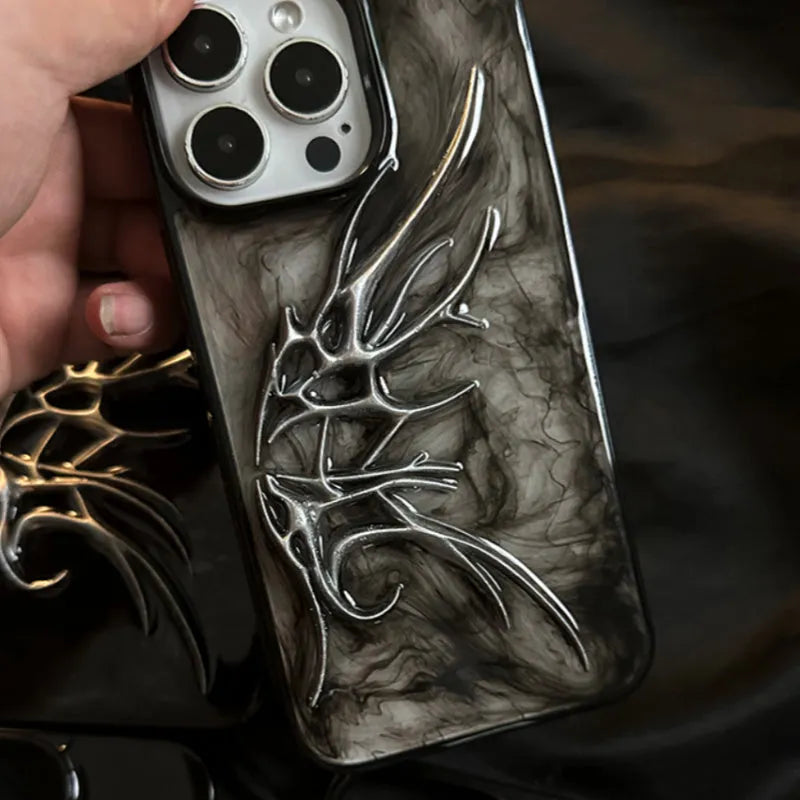 Black iPhone case with three-dimensional wings design showing textured surface