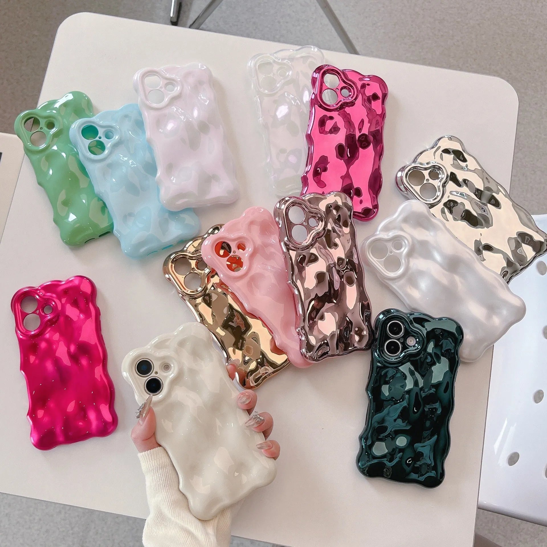Niche Advanced Sense Plating Shell TPU phone case with wave bubble finish in silver electroplated colour