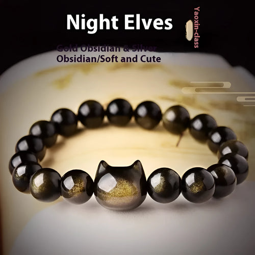 Obsidian cat head bracelet with round beads in gold or silver style, showing cat charm detail.