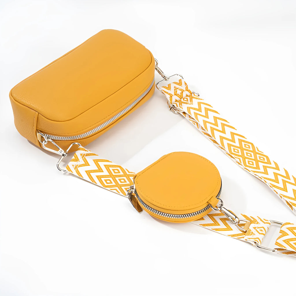 Soft black PU crossbody bag for women with a single shoulder strap and decorative sewing thread details.