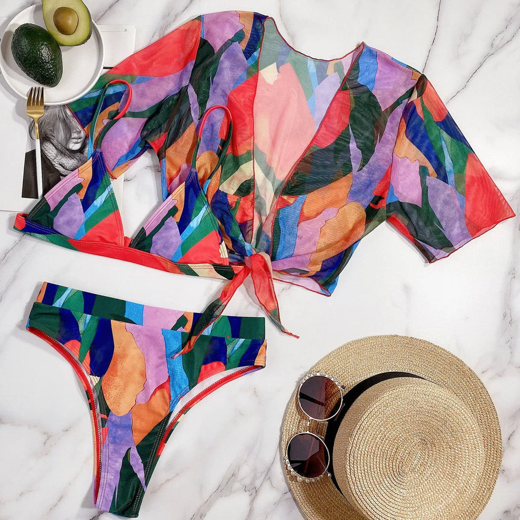 Red women's split bikini swimsuit made from nylon fabric.