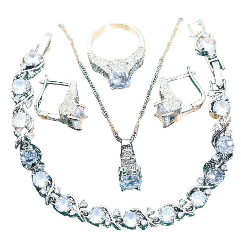 Bridal zircon alloy jewellery four-piece set showing necklace, earrings, ring and bracelet on water wave chain
