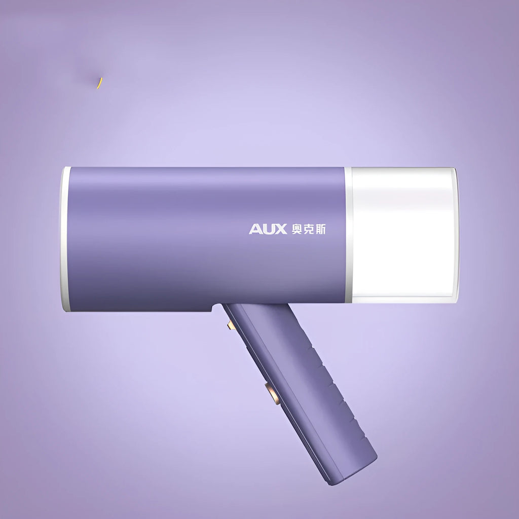 Foldable handheld clothes steamer in grey lotus root purple on a table.