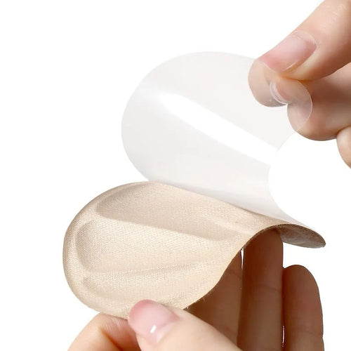 Three pairs of camel-coloured anti-slip heel cushion pads measuring 9.3x6cm