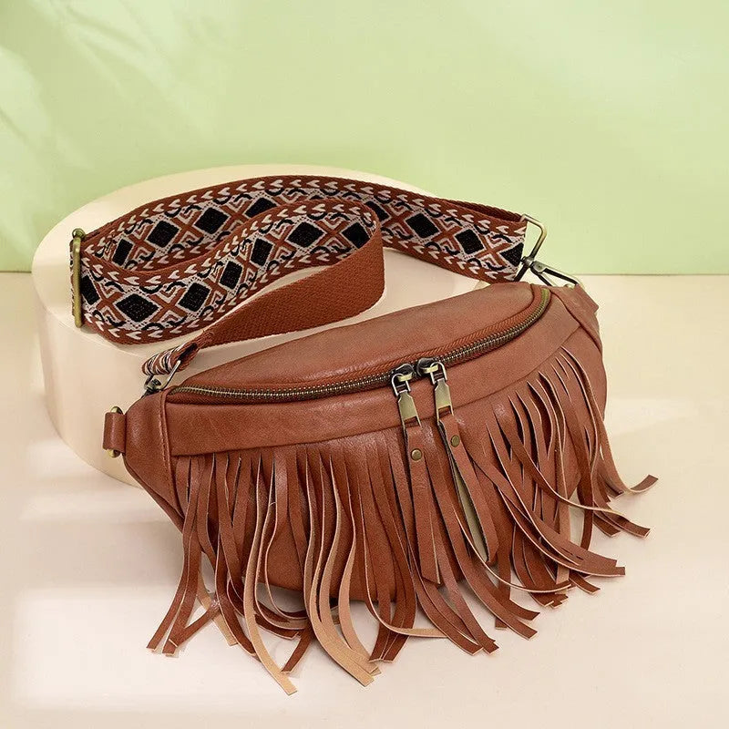 Retro-style pleated messenger crossbody bag in PU leather with a tassel, shown in macaron-gray.