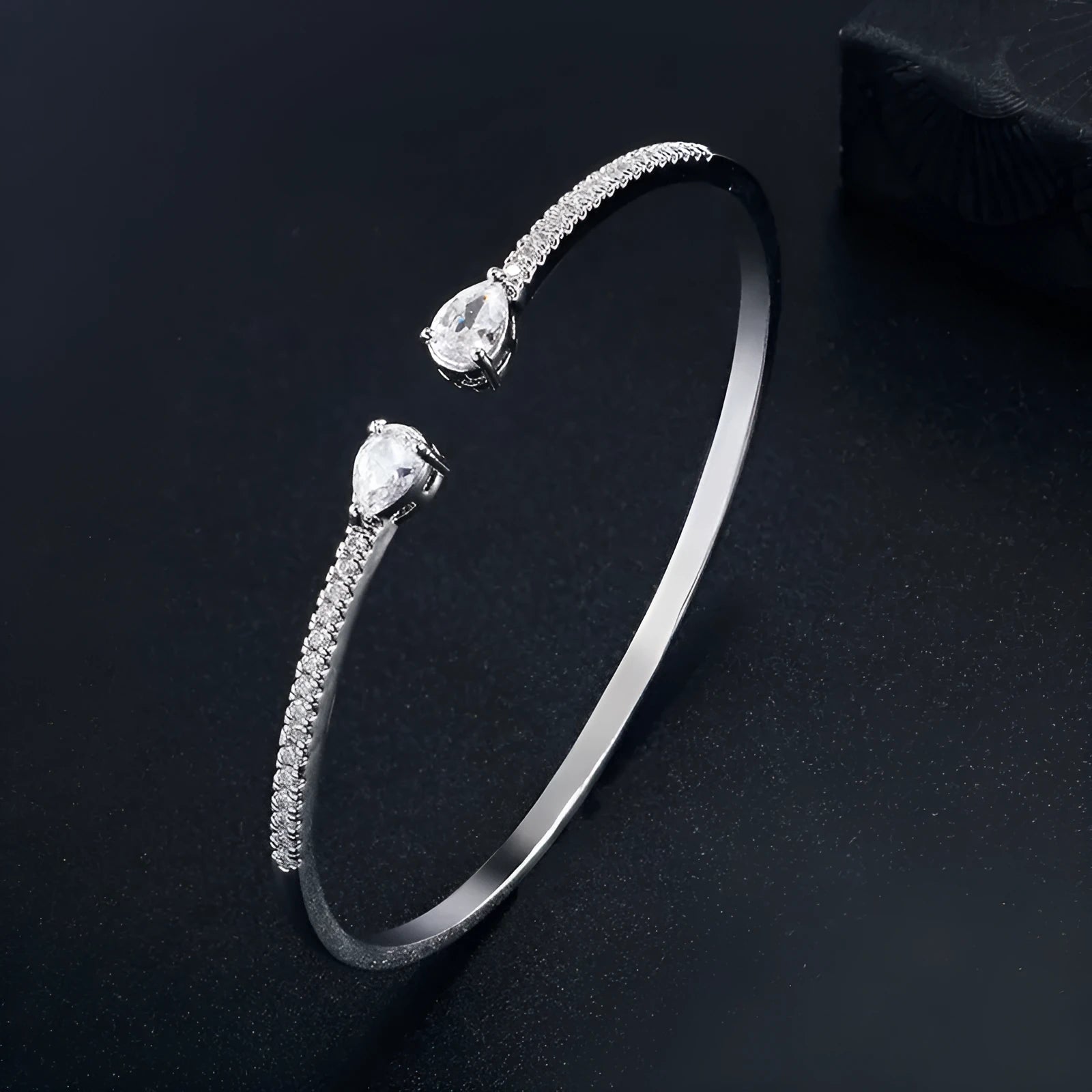 Copper personalised bracelet with multi-zircon inlay detail in white or blue colour