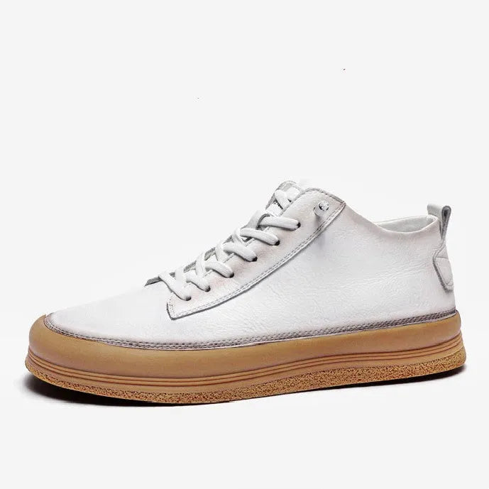 Men's black leather casual shoes with a round toe and white rubber sole on a plain background.
