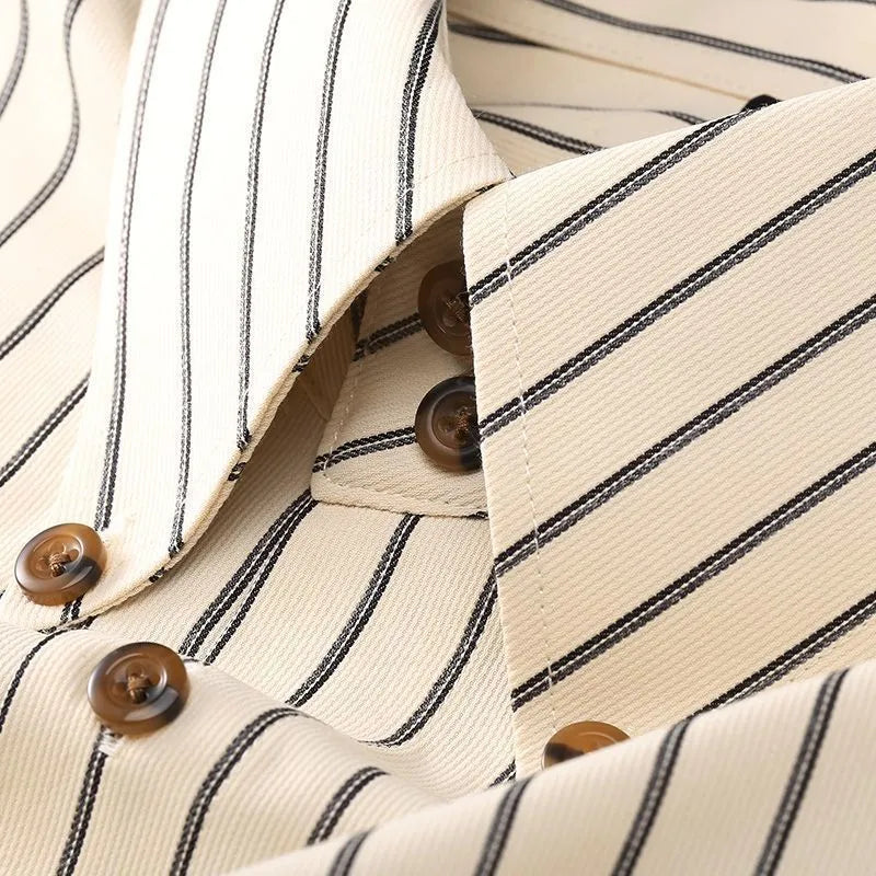 Coffee coloured striped men's long-sleeved shirt with slim fit on a hanger.