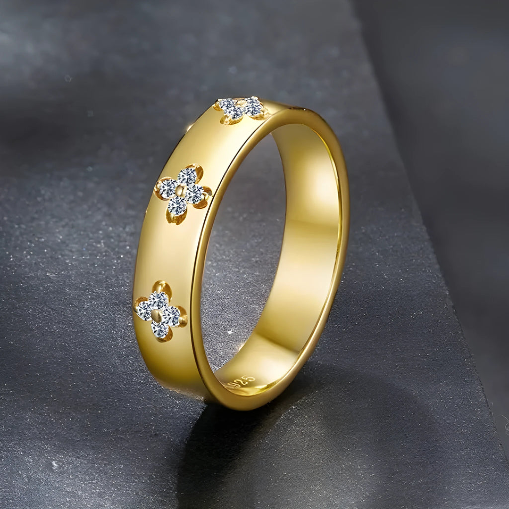 Gold plated sterling silver moissanite wedding ring on finger simple style