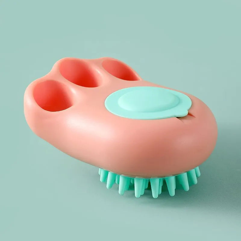 Blue pet bath and massage brush with silicone bristles and an ergonomic non-slip handle.