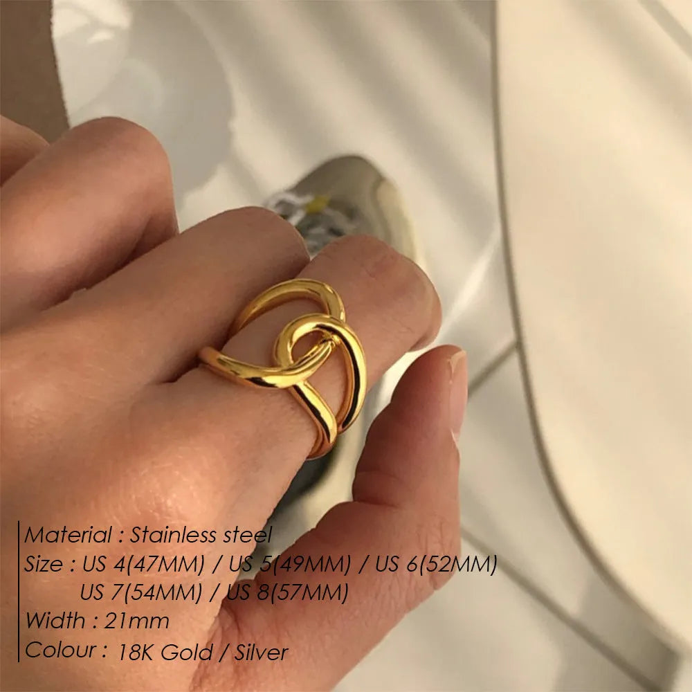 Women's adjustable knotted geometric ring in stainless steel showing U-shape opening design