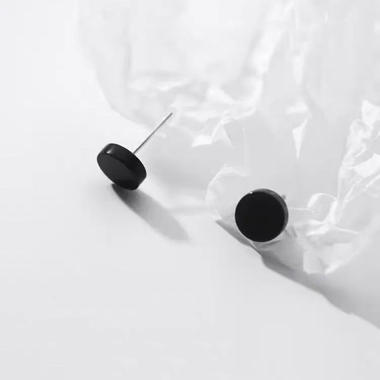 S999 sterling silver round flat ear bone studs in black and silver finishes, showing 3mm to 8mm size range