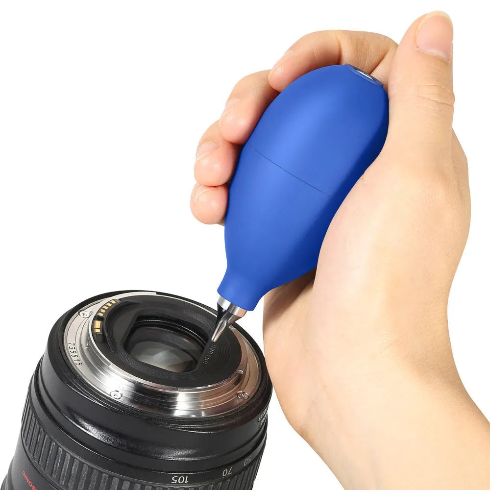Blue rubber dust removal air blowing ball for cleaning camera lenses and phone screens.