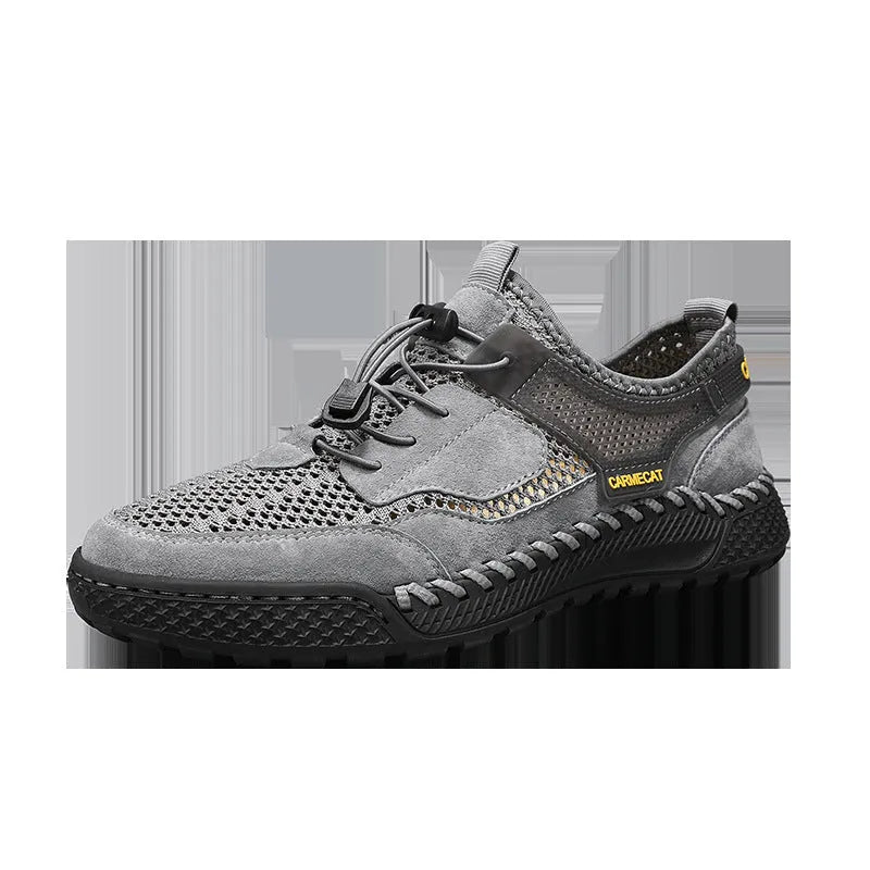 Men's brown suede low-top casual tennis shoes with a visible elastic band and hand-stitched rubber sole.
