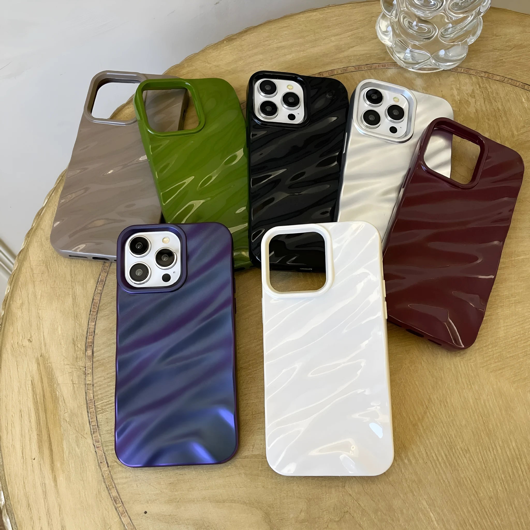Soft wave-pattern TPU phone case for Apple iPhone 17 in Burgundy colour.