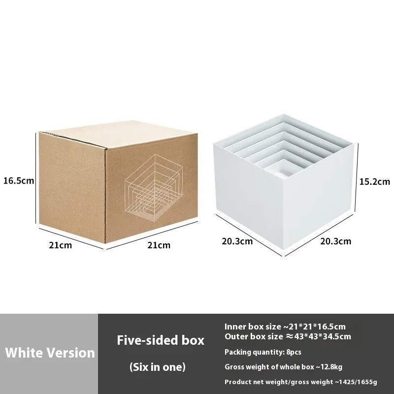 White plastic cube dessert display stand set of six pieces arranged on a table.