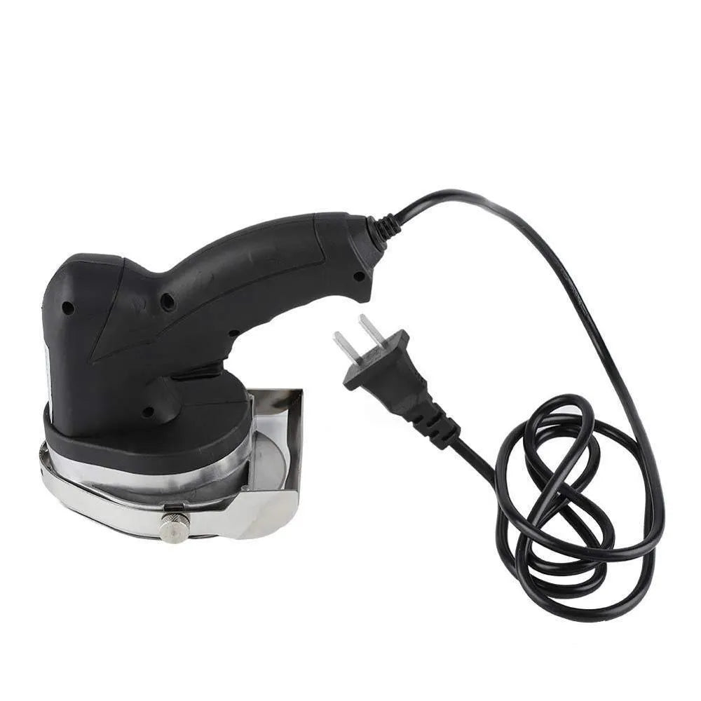 Black electric meat cleaver with power cord for processing turkey and barbecue meats.