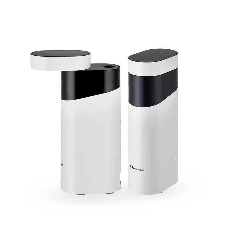 Black portable instant water dispenser with digital display on a wooden desktop.