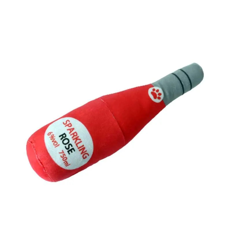 Green plush dog toy shaped like a wine bottle on a white background.