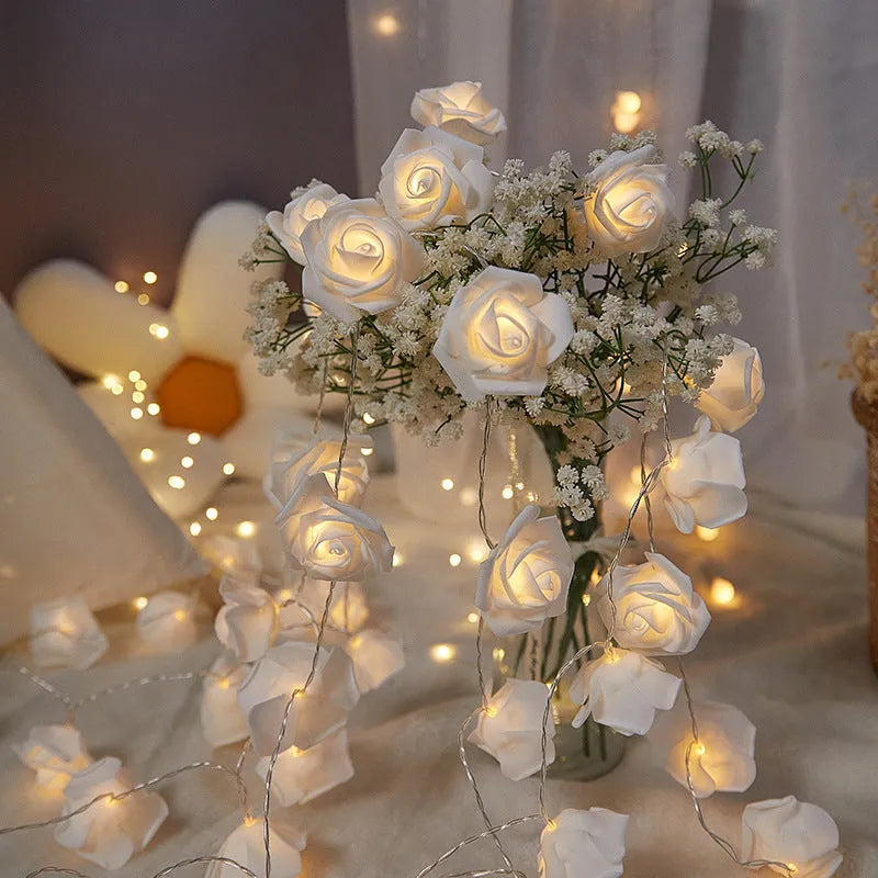 Indoor battery-powered LED rose decorative light string in one of seven colour options