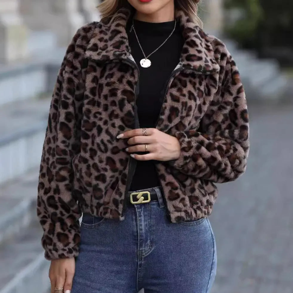 Women's loose fit leopard print plush coat with front zipper closure showing raglan sleeves