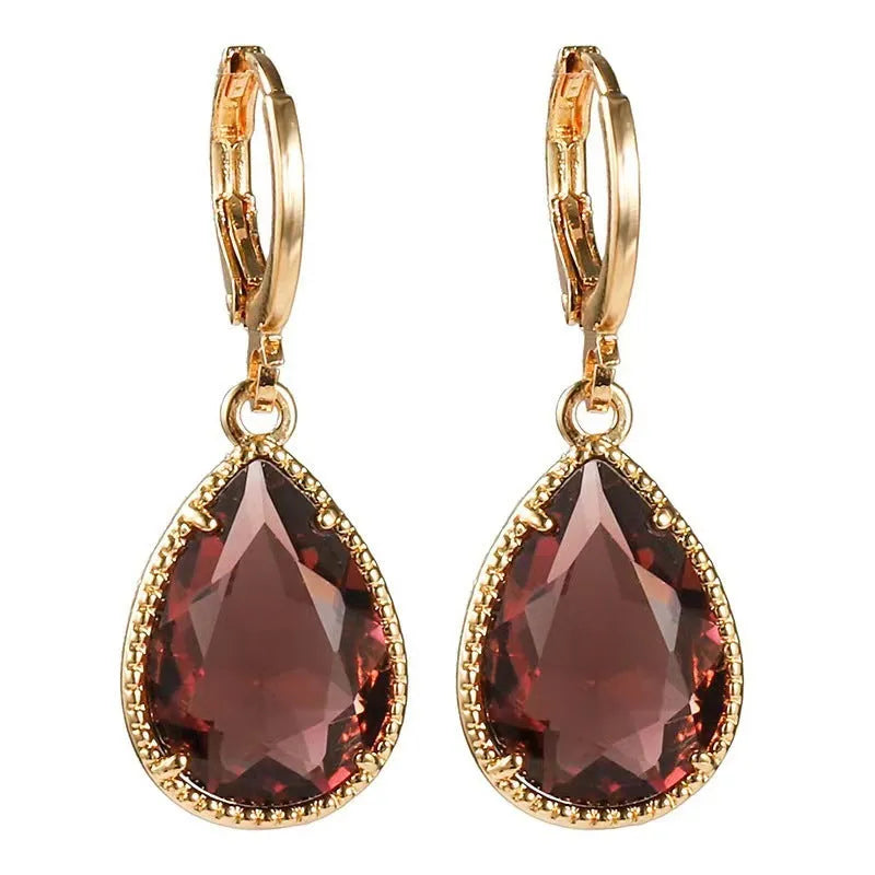 Geometric glass water drop earrings with carved Saturn design in multiple colours