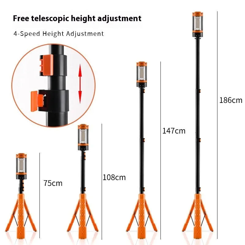 Retractable folding charging camping lantern in black and orange with bracket and pull string extended on a table