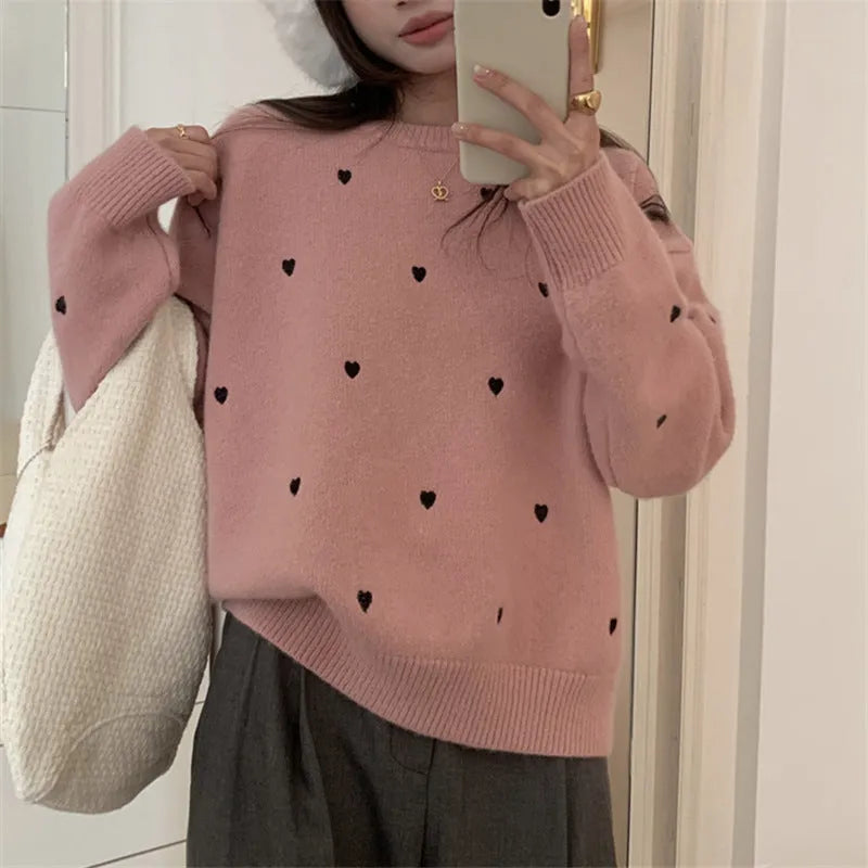 Women's loose acrylic pullover sweater with embroidery details in milky white colour