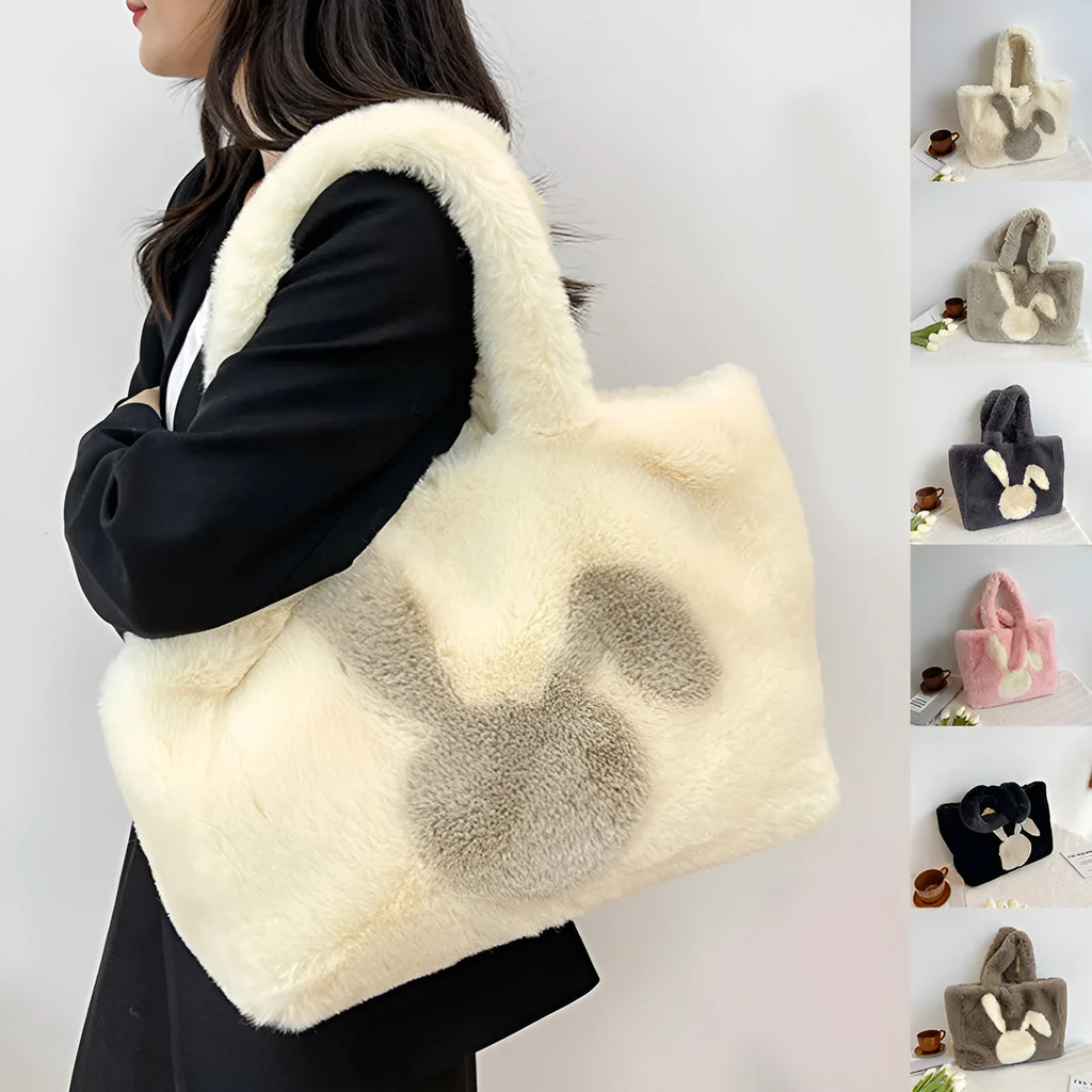 Soft beige plush tote bag with cartoon rabbit ears on the front, shown as a large capacity shoulder bag.