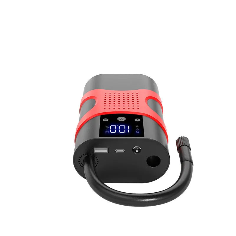 Portable car emergency jump starter with digital display air pump on a dark background