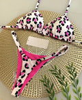 Women's printed nylon bikini with briefs style and cotton lining for swimming sports.