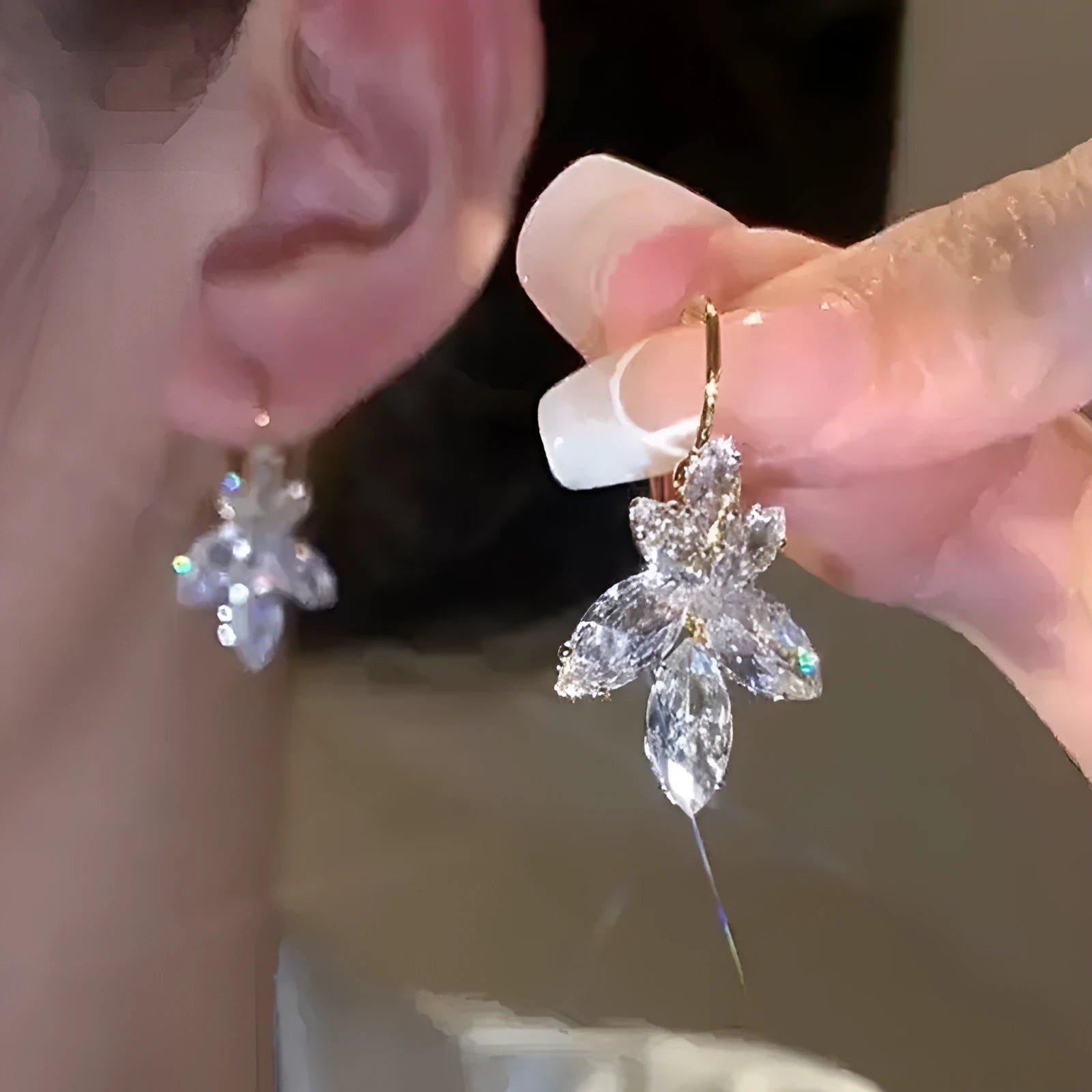 Women's platinum alloy earrings with leaves shape and inlaid zircon stones