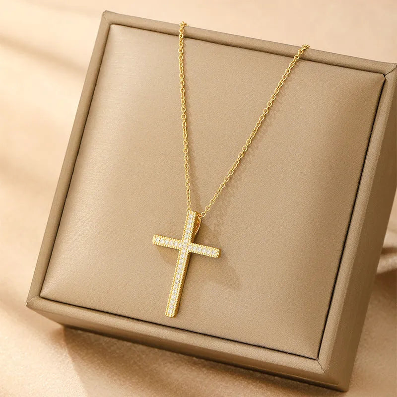 Women's copper necklace with electroplated finish showing heart, butterfly, cross, and round diamond pendant options