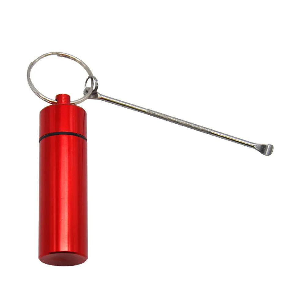 Blue aluminium portable medicine bottle with attached spoon and keychain for medication organisation
