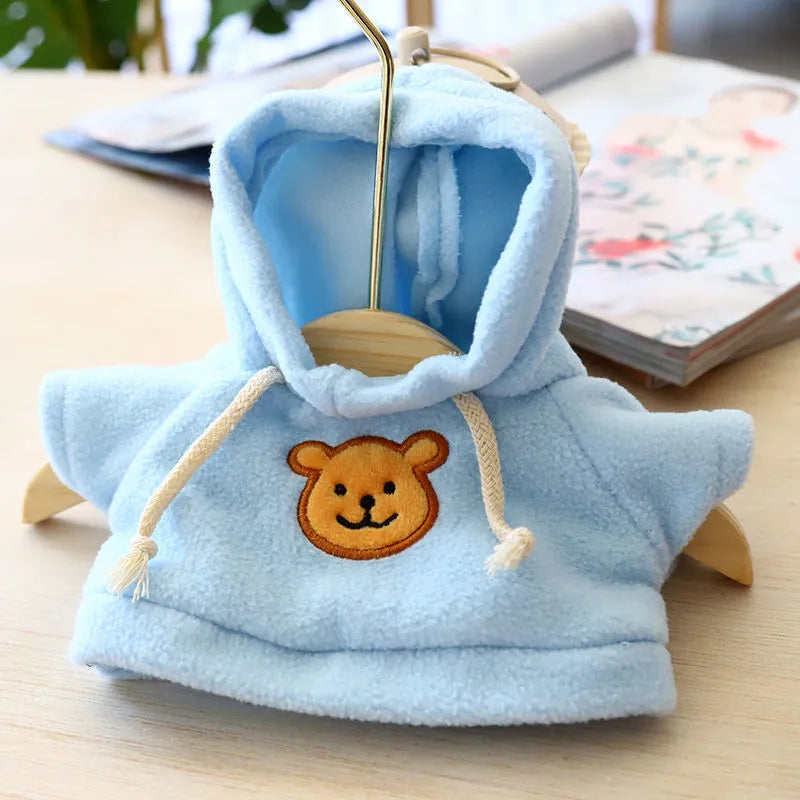 Blue balaclava-style dog hoodie made of soft cloth, shown on a model dog.
