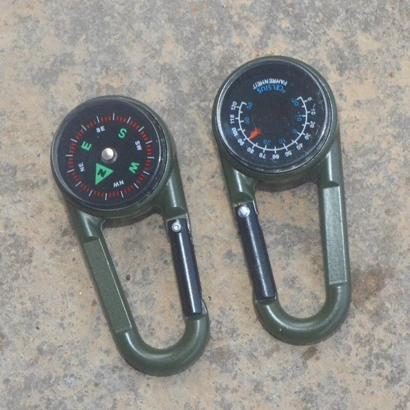 Army green zinc alloy outdoor carabiner with built-in fluid compass and liquid thermometer showing temperature scale