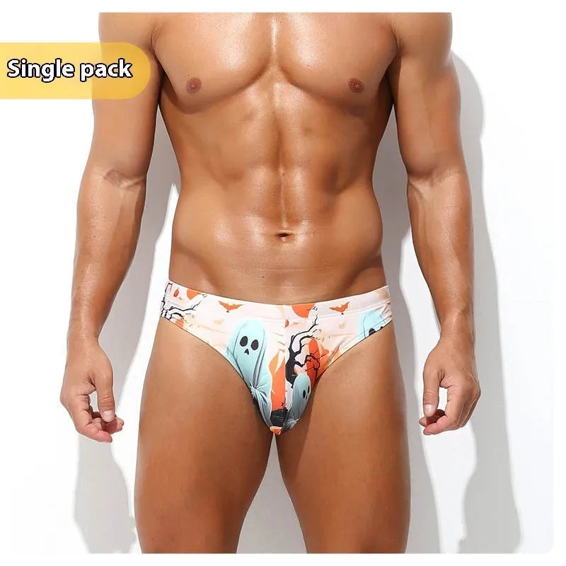 Men's low-waisted quick-drying briefs with digital print design on polyester fabric.