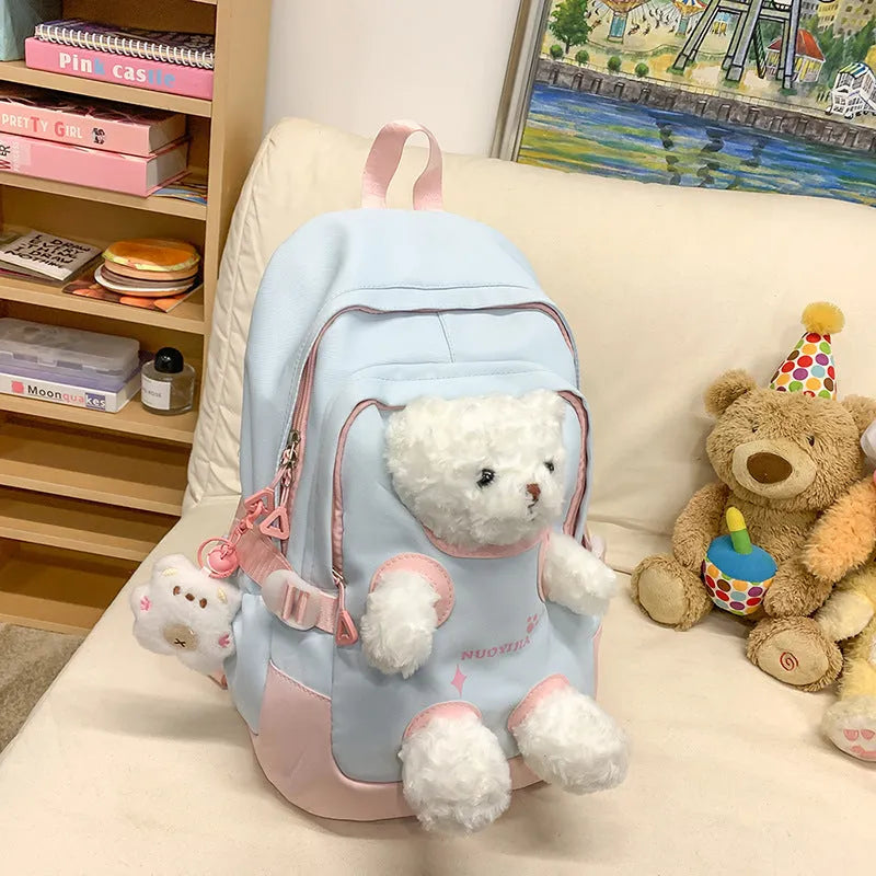 Nylon school backpack in macaron colours with curved shoulder straps and 20-35L capacity