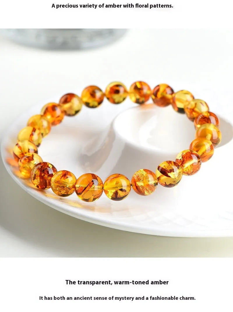 Natural yellow piebald amber bracelet with geometry beads showing flower spot patterns