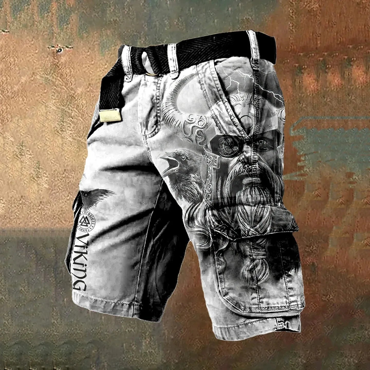 Man wearing black polyester shorts with a 3D digital printed pattern.