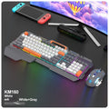 Blue wired gaming keyboard and mouse set with backlit keys on gaming desk
