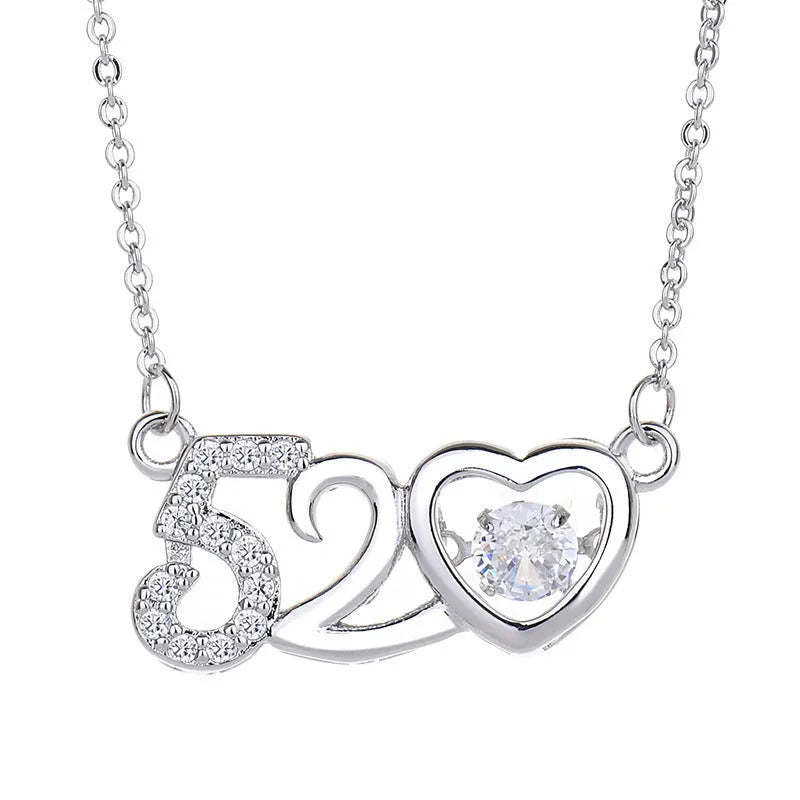 Sterling silver heart necklace with crown and bow details in rose gold or silver finish